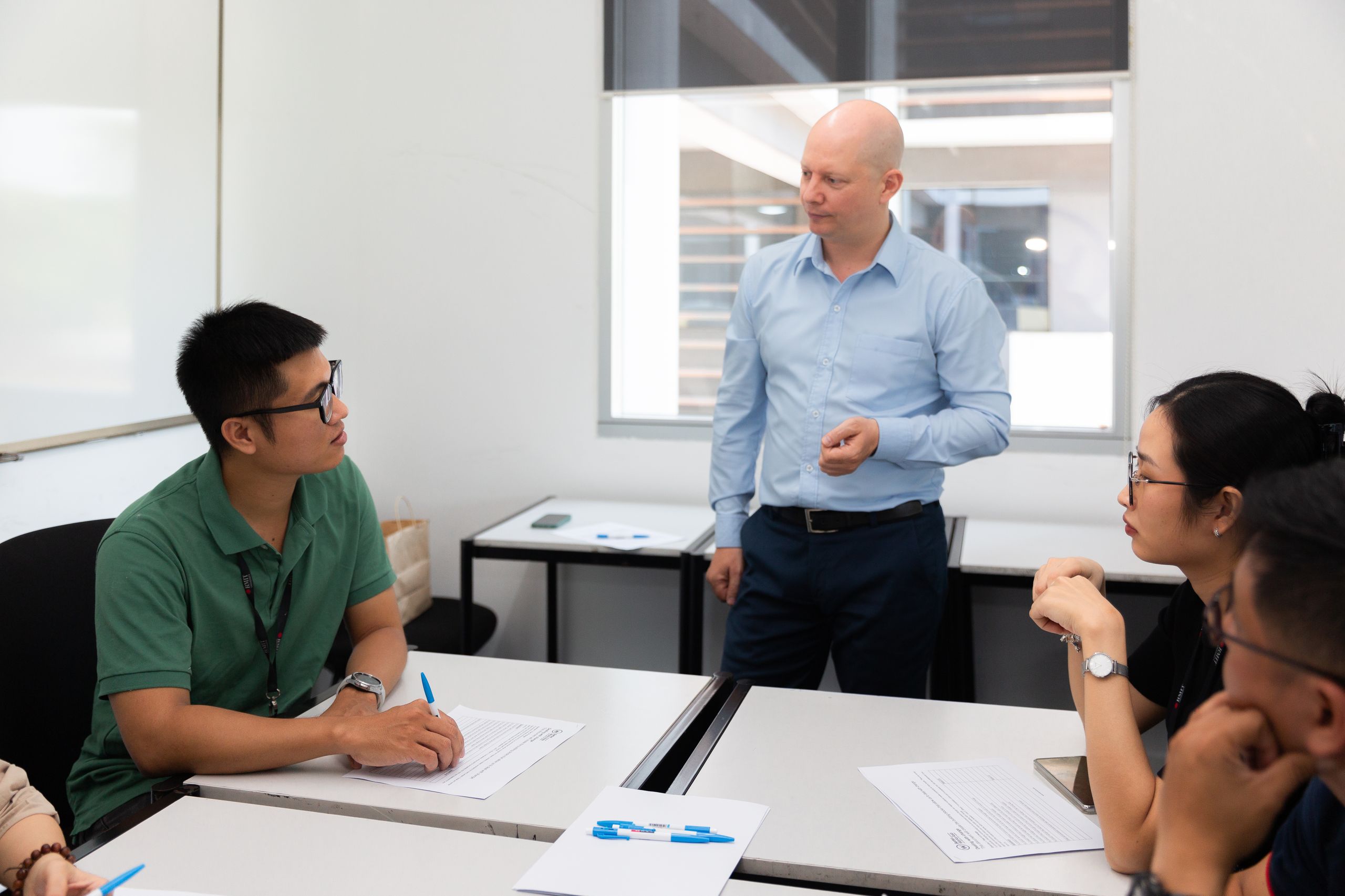 A facilitator working with a small team